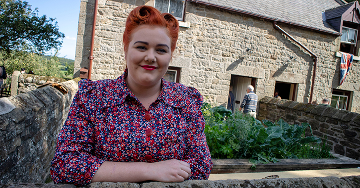 A Land Girl at The 1940s Farm at Beamish Museum.